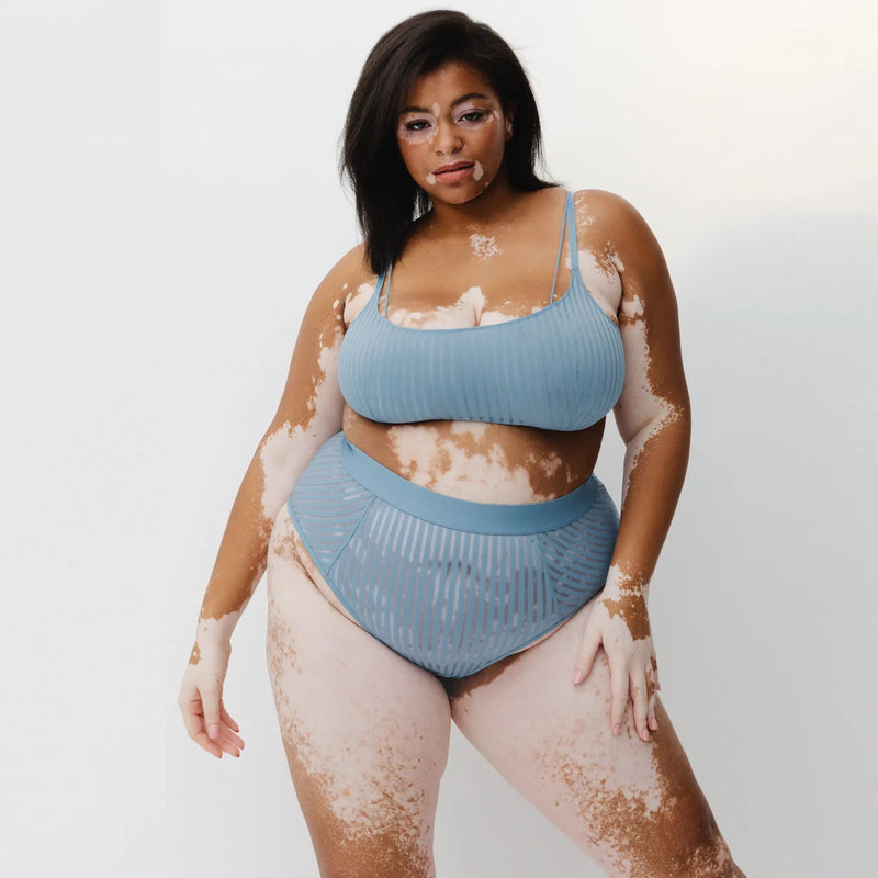 Monique Morin Model 5'8" wearing size 2X