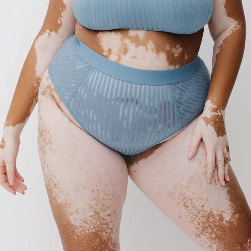 Monique Morin Model 5'8" wearing size 2X